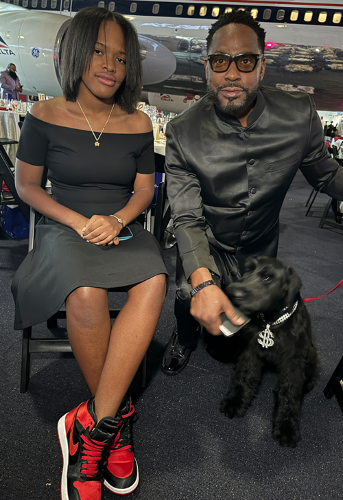 Lamont Cooper and daughter, Auction winner of dog