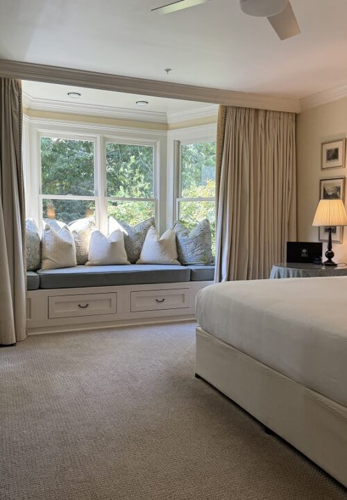 Soft natural light, rustic textures, and understated elegance create a room designed for deep rest and slow mornings.